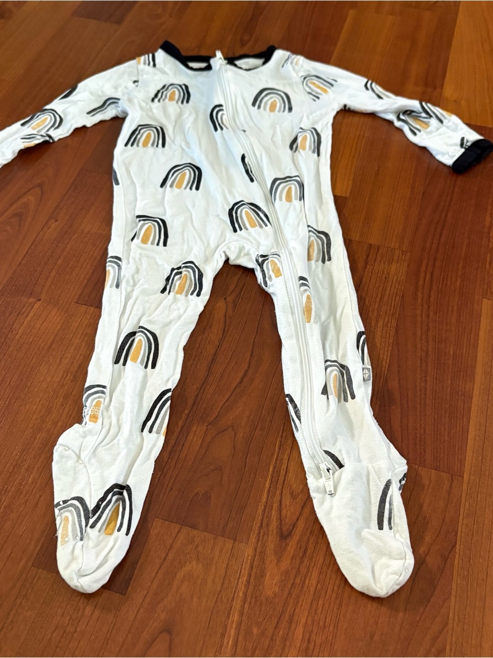 Kyte Baby 12 month White Footed One-Piece with Black & Mustard Rainbow Print